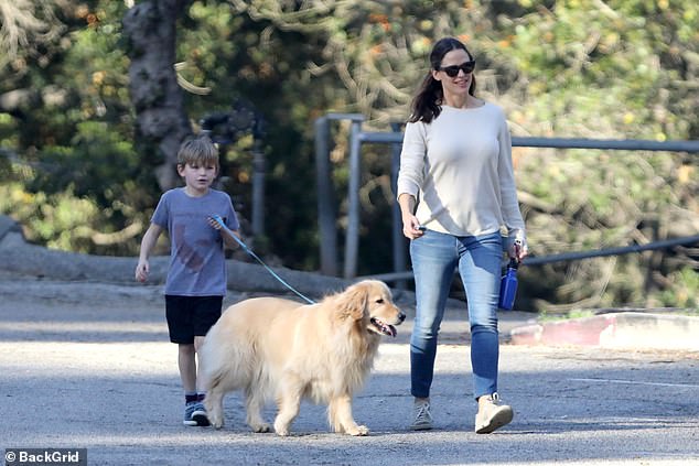 The starlet is often spotted taking walks with her children and their beloved family dog;  Jennifer, son Samuel and Birdie seen in 2019