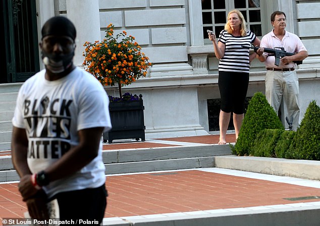 No shots were fired and no one was injured as the stone-faced couple guarded their home