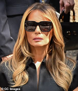 Melania wore her signature statement sunglasses to Ivana Trump's funeral in July last year.