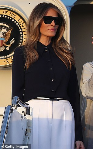 Melania wore a silky black blouse as she greeted Japanese Prime Minister Shinzo Abe and his wife at Palm Beach International Airport in 2017.