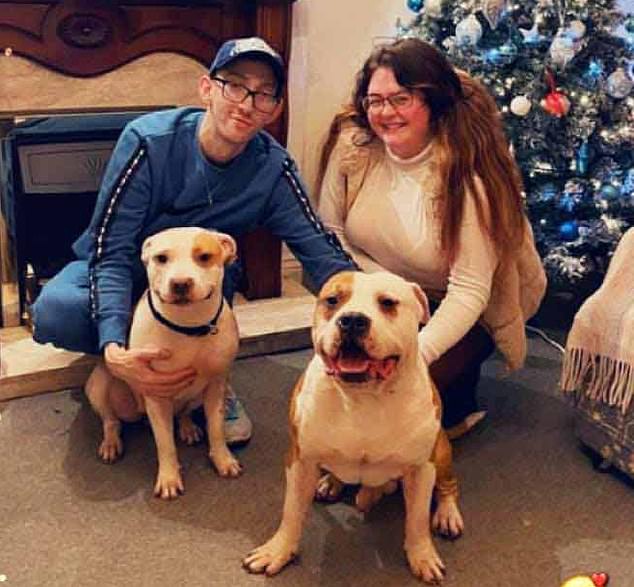 Mrs. Morey is shown with two pets.  It is not known if any of the dogs pictured were involved