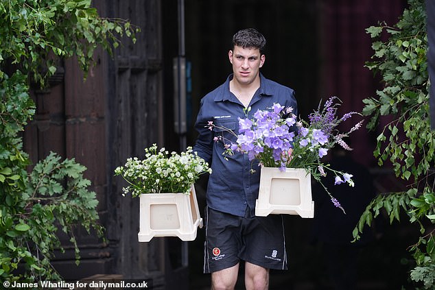 Dozens of boxes of beautiful flowers were delivered to the cathedral by a fleet of vans on Thursday