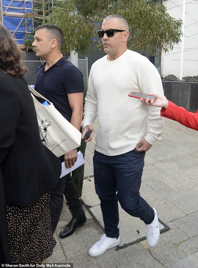 The former AFL star (pictured leaving court on Friday) will not have to wear an ankle monitor due to his compliance with current treatment