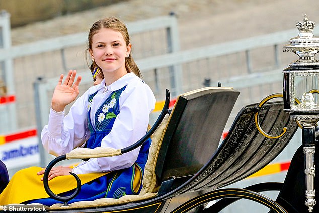 Princess Estelle, 12, looked regal as she waved to the crowds in Stockholm during today's festivities