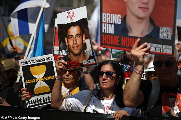 Hostage Oz Daniel's mother (centre) is part of a protest campaign to return Israeli hostages in central London