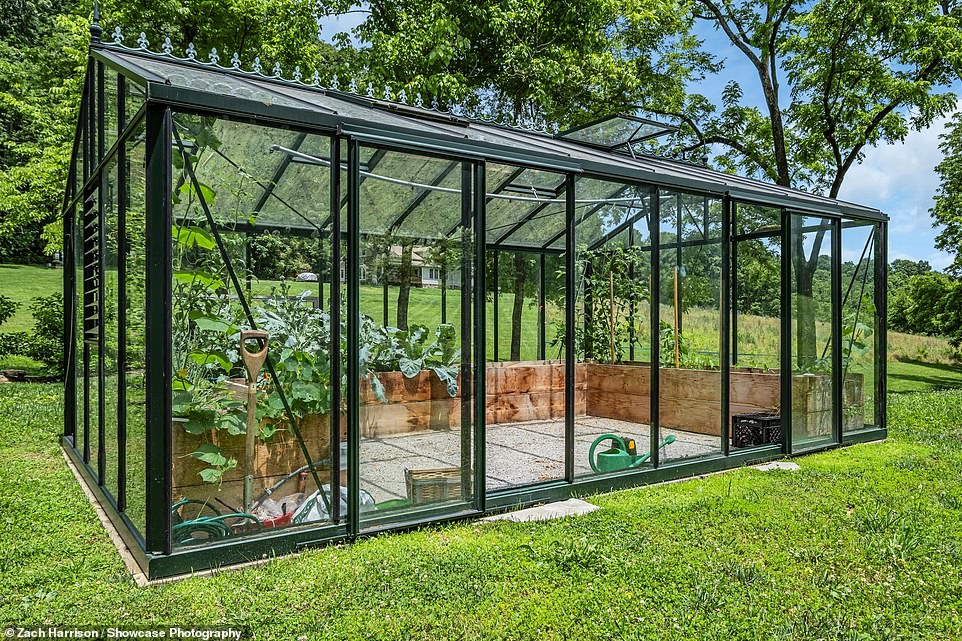 The property includes a greenhouse, which could also be a chicken coop, according to the advertisement