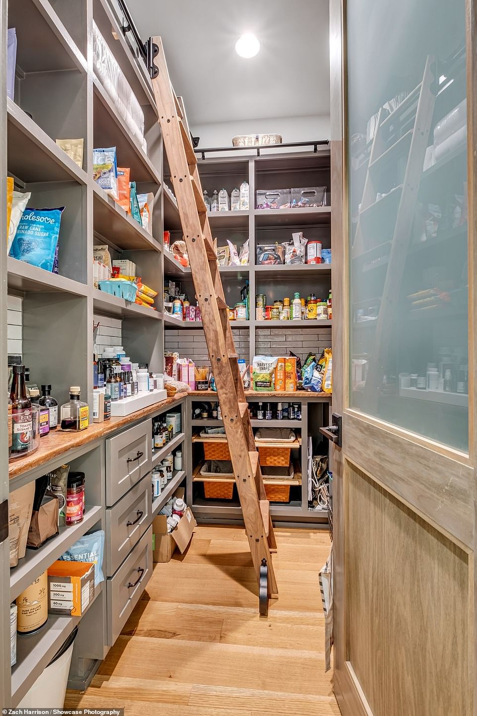 The kitchen has a huge walk-in pantry