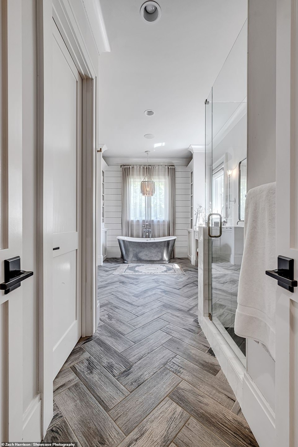 She has a soaking tub in her luxurious master suite bathroom