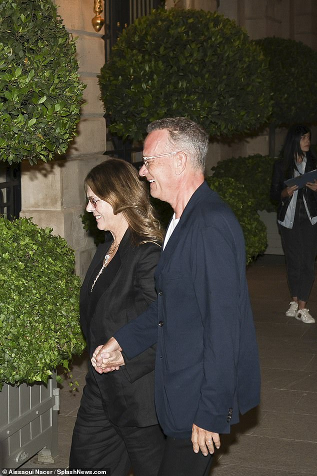 The pair held hands as they arrived back at the hotel