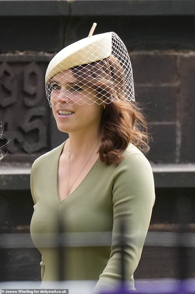 Pictured alongside some of the 400 guests invited to today's celebration, mum-of-two Eugenie – daughter of the Duke and Duchess of York – teamed her stunning V-neck dress with a chic cream fascinator