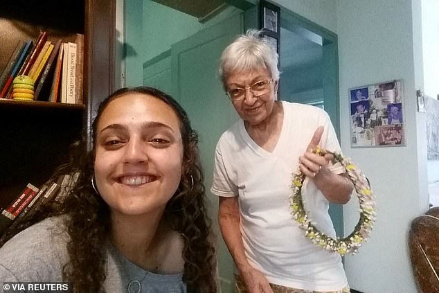 Romi Gonen, 23, who was kidnapped from the Nova festival during the deadly October 7 attack by Palestinian Islamist group Hamas, is pictured with her grandmother Dvora Leshem, 87