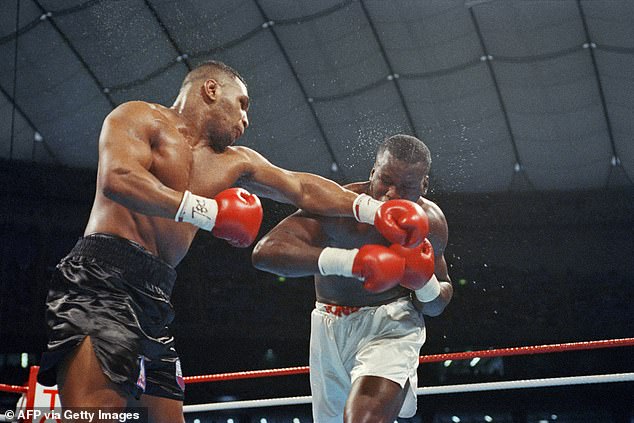 Previously undefeated Mike Tyson (left) was knocked out by James Douglas (right) in 1990