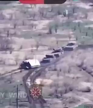 Another video shows three Russian tanks with tarpaulins plodding through a battlefield near the Ukrainian-occupied city of Krasnohorivka as they come under fire