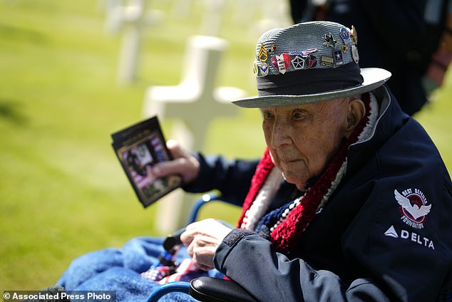 Larson visits graves at the Normandy American Cemetery in Colleville-sur-Mer