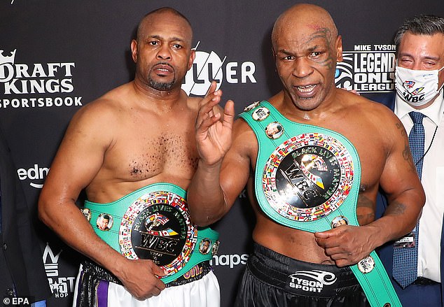 Tyson fought to a split-decision draw with Roy Jones Jr. during the COVID lockdown.  (left).