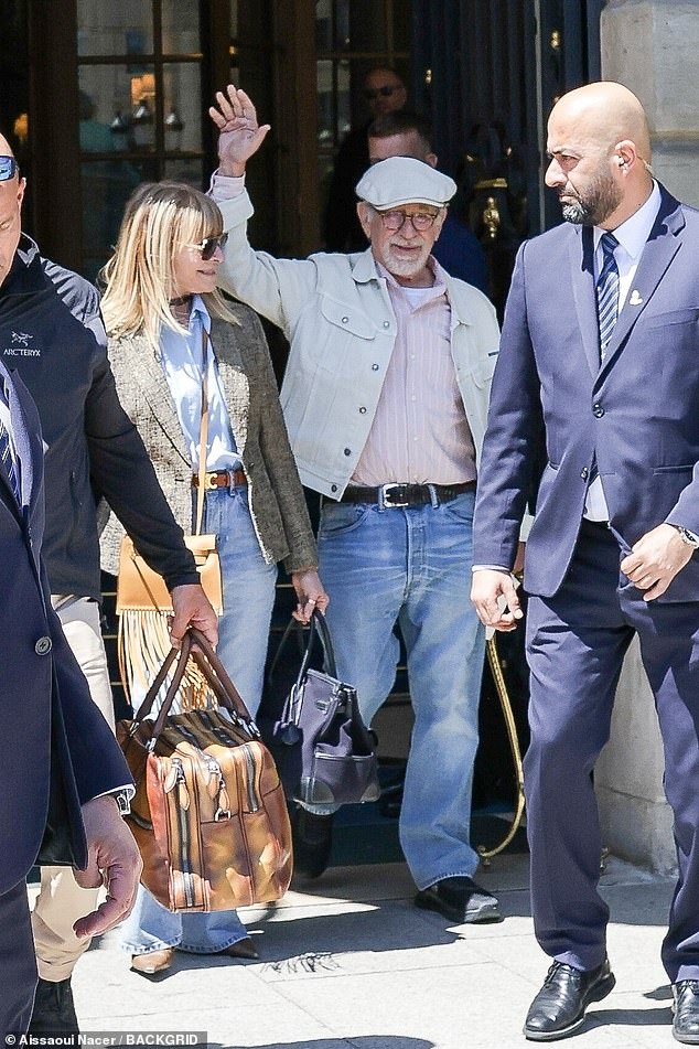 Steven was in good spirits as he and his wife Kate left the hotel