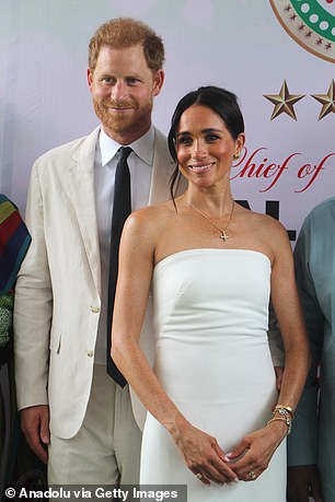 The Duchess of Sussex, pictured with Prince Harry last month, is among the famous fans