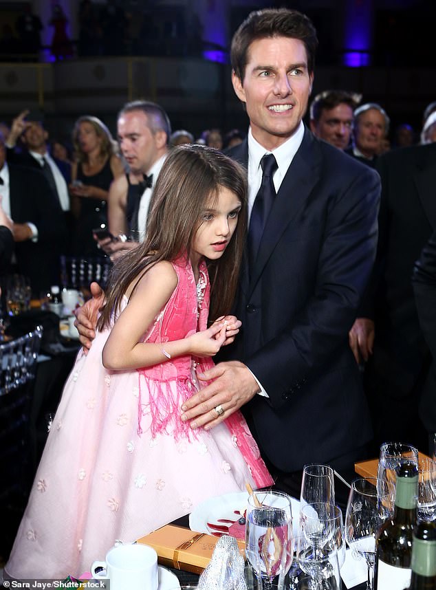 The actor's close bond with his adult children is a far cry from the relationship he shares with his biological daughter, Suri, who turned 18 last month and has reportedly been estranged from her father for more than a decade.