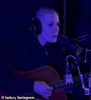 Throughout the segment, she strummed notes on a guitar while singing some of the lyrics