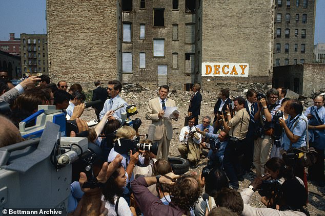 Trump has also boosted his chances in the deeply Democratic state by drawing inspiration from Reagan's campaign playbook;  pictured: Reagan during a campaign stop in the South Bronx prior to the 1980 election