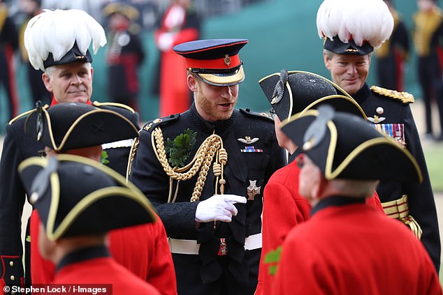 The Duke of Sussex talks to Chelsea Pensioners in 2019 while wearing full military fatigues