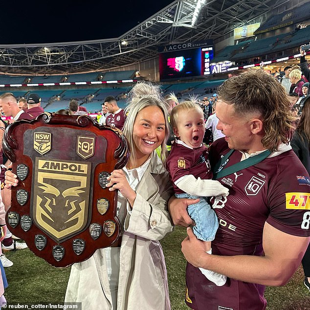 Reuben, Mackenzie and Sunny celebrate winning the State of Origin shield in Sydney