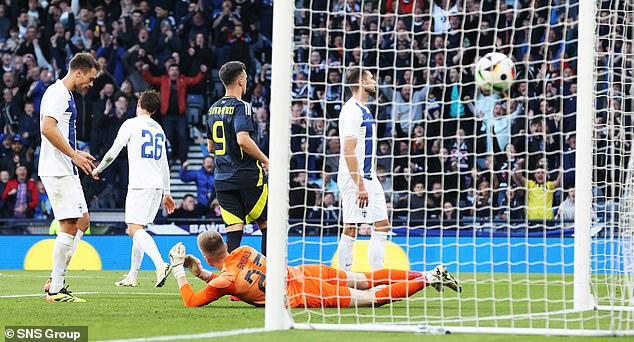 The ball settles into the net as Arttu Hoskonen's own goal in the second half finally breaks the deadlock