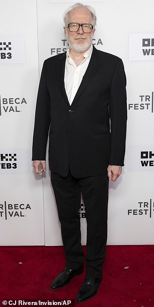 Tracy Letts, who also stars in the film, wore a black suit and white shirt with no tie as he walked the red carpet