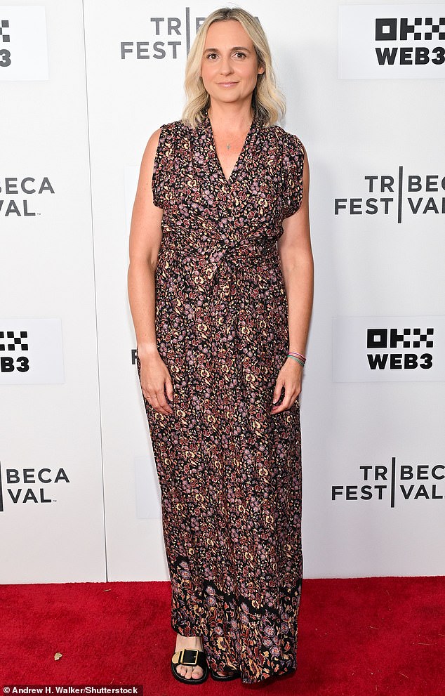 Co-writer Alex Gioulakis looked stunning in a sleeveless, ankle-length floral dress with black open-toe heels