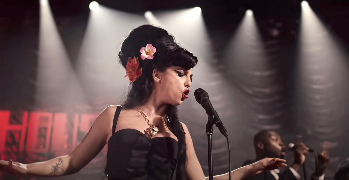 An actress who plays Amy Winehouse and performs with her signature beehive hairstyle