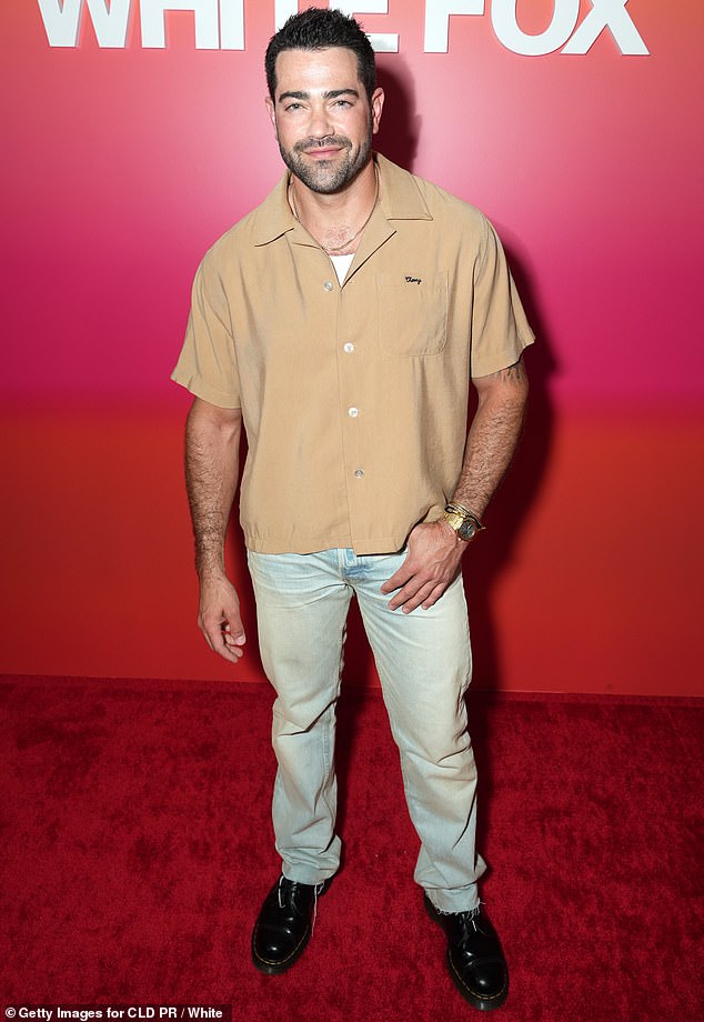 Desperate Housewives heartthrob Jesse Metcalfe exuded showbiz magnetism in a tan shirt that fell open enough to reveal a hint of his undershirt