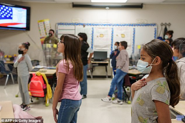 Third-grade students participate in the American national anthem at Highland Elementary School in Las Cruces, New Mexico