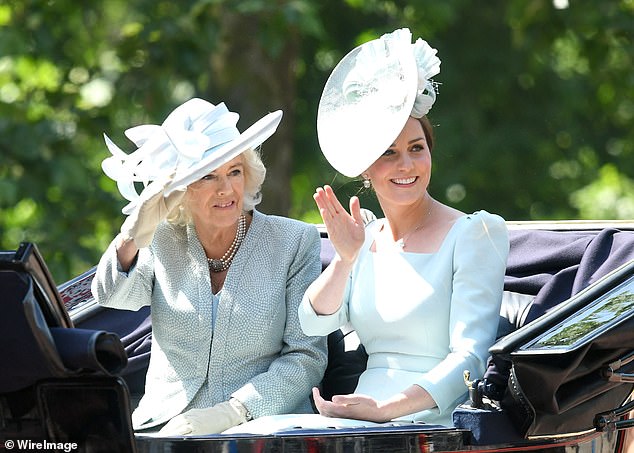 In 2018 it was muted icy blue tones, with the Duchess of Cambridge wearing a light blue square-neck dress by Alexander McQueen, one of her favorite designers.  She combined the dress with a hat by Juliette Botterill