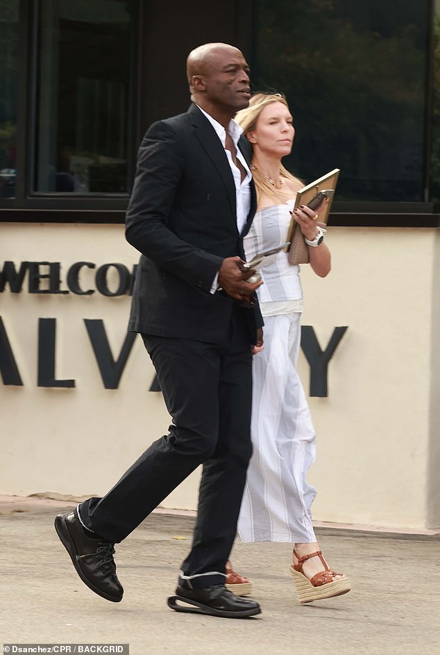 Seal was accompanied by his assistant girlfriend Laura Strayer