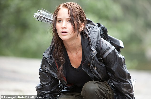 It comes after it was revealed that a fifth novel in Suzanne Collins' series will be published next year, with a film adaptation also in the works (Picture: Jennifer Lawrence as Katniss Everdeen)