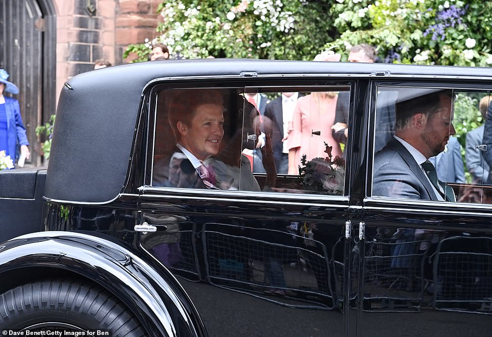 The Duke of Westminster and his wife Olivia leave their wedding ceremony at Chester Cathedral