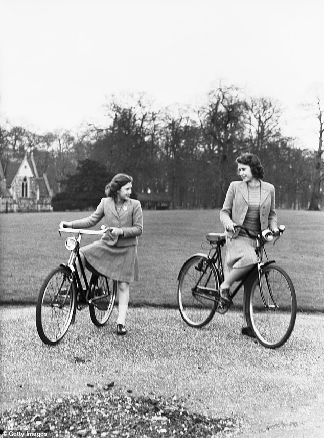 Princess Elizabeth and her sister Princess Margaret on their bicycles in the grounds of Royal Lodge, April 1942