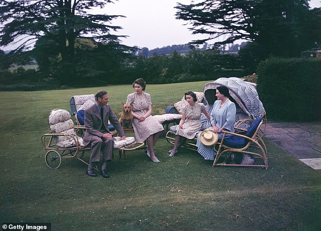 The Queen Mother focused on the 30 hectares surrounding the Royal Lodge, which she preferred to call her personal garden, creating paths lined with hedges, trees and beautiful flower beds.  Above: King George VI, Queen Elizabeth and their daughters Princess Elizabeth and Princess Margaret sit in the garden of Royal Lodge, 1946