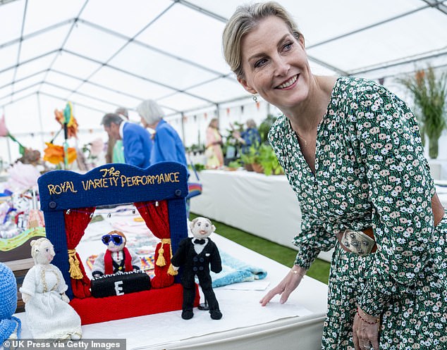 During the event, the royal family was presented with knitting figures representing her, her husband Prince Edward and Elton John