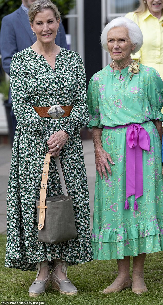 Another famous face at the event was Dame Mary Berry (pictured, right), who posed for a photo with the Duchess (pictured, left)