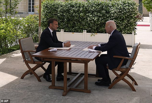 Macron and Biden pictured during their working lunch at the Elysee Palace, Paris