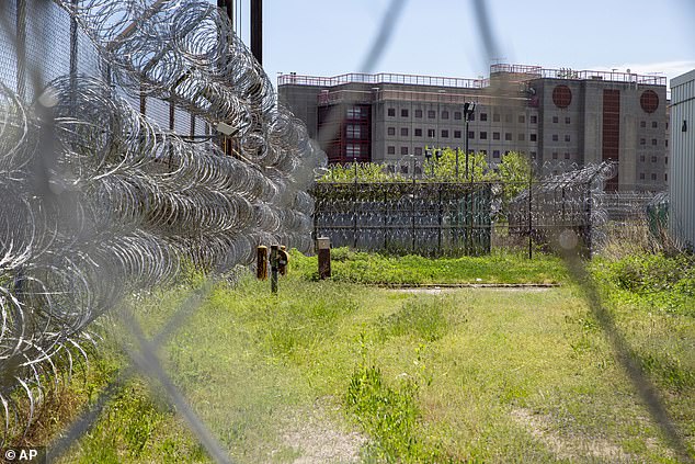 In a garden on Rikers Island, the New York City jail where Trump would most likely be sent if jailed