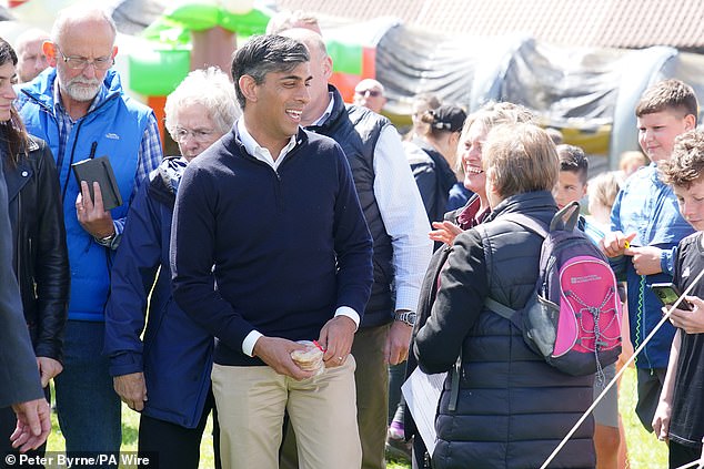 The Prime Minister pictured today at a village fete in Great Ayton, Yorkshire, on his way to the election campaign