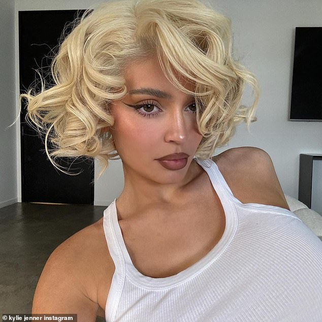 On Friday, she posted two photos on Instagram of herself wearing a short, blonde, curly wig reminiscent of the style Marilyn Monroe was known for.  She did her makeup dramatically with winged black eyeliner, brown lined lips with nude gloss and rosy cheeks