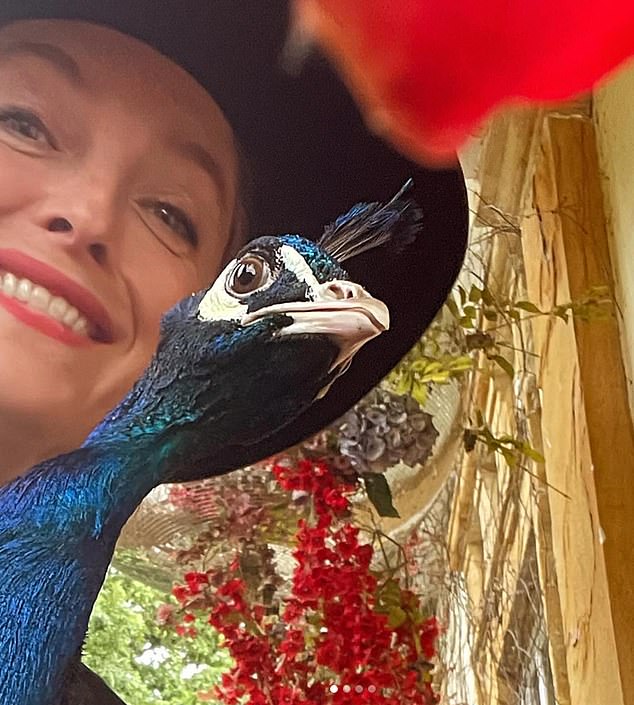Fashion designer Alice Temperley posted a photo on Instagram with the peacock she took into her home