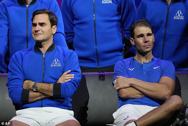 Roger Federer (left) and Rafael Nadal (right) say an emotional farewell after the announcement that the doubles match would be the last of Federer's career