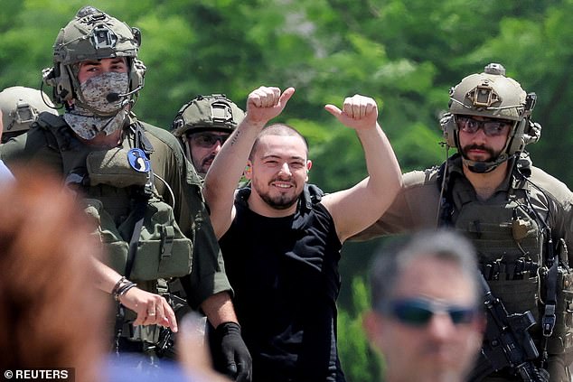 Rescued hostage Almog Meir Jan reacts after making it out of central Gaza Strip alive after being rescued by mission soldiers on Saturday