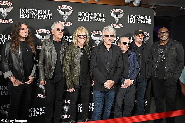 The star added dark-tinted aviators to the mix as he was joined by bandmates Phil X, Hugh McDonald, David Bryan, Tico Torres, John Shanks and Everett Bradley.