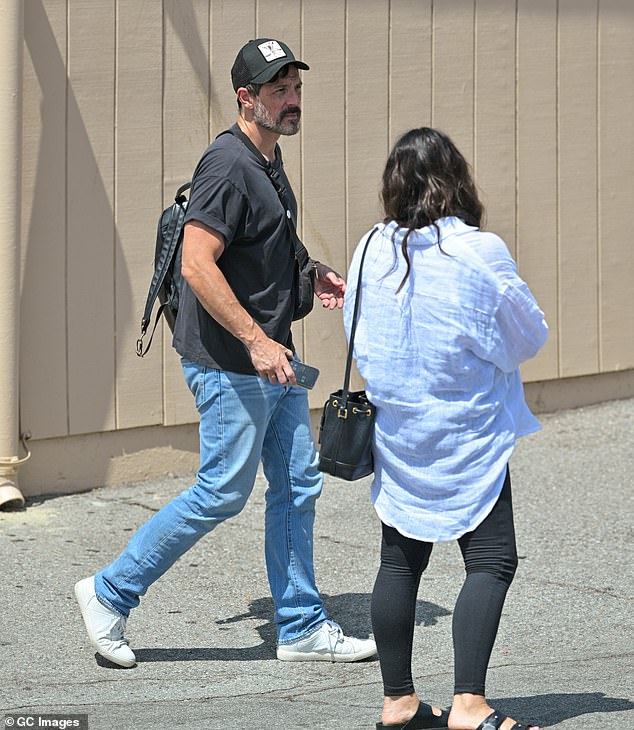 Her handsome fiancé Steve opted for a black cuffed T-shirt and light jeans