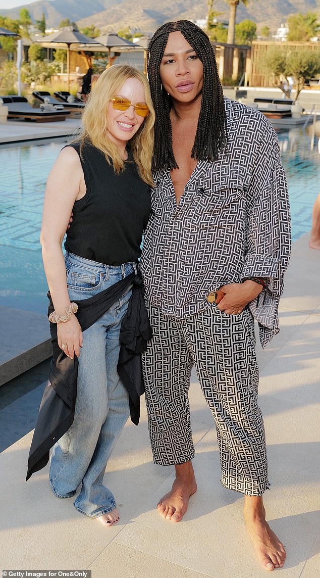 Kylie posed with Balmain creative director Olivier Rousteing (right) at the party